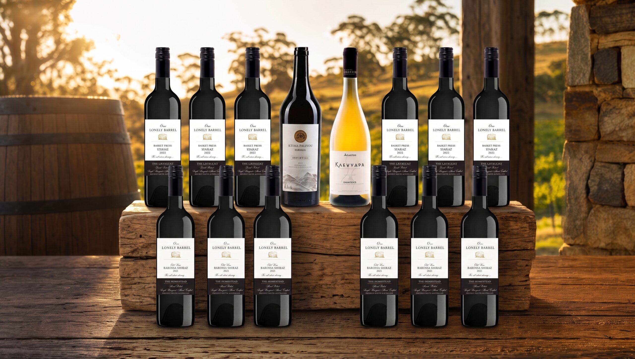 Twelve bottles of One Lonely Barrel wine on a barrel-room table